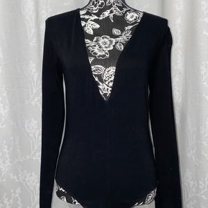 Black, long-sleeve leo with plunging neckline!